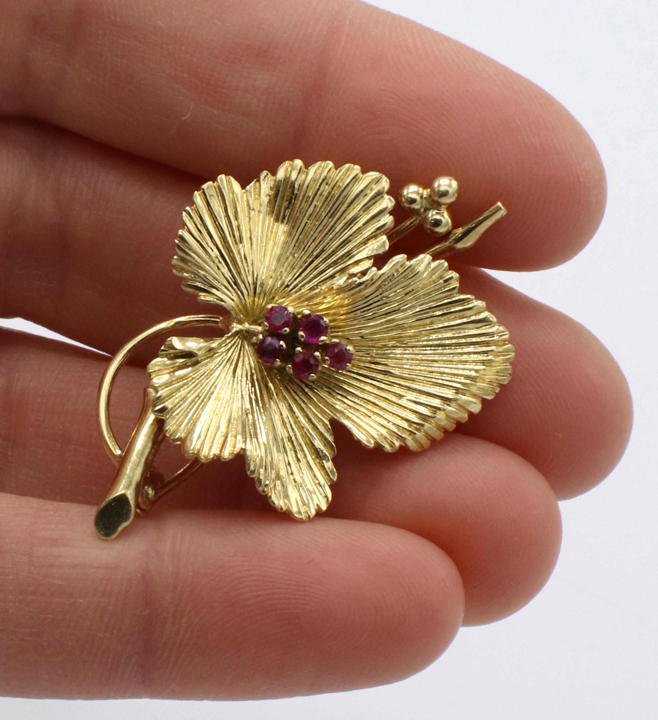 Tiffany & Co. 18 Karat Yellow Gold Ruby Leaf Pin Brooch
Metal: 18k yellow gold
Weight: 7.44 grams
Length: 29.5mm
Width: 30mm
Signed: Tiffany & Co. 18K Italy
