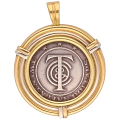 Tiffany & Co. 18 Karat Yellow Gold Silver Coin Pendant