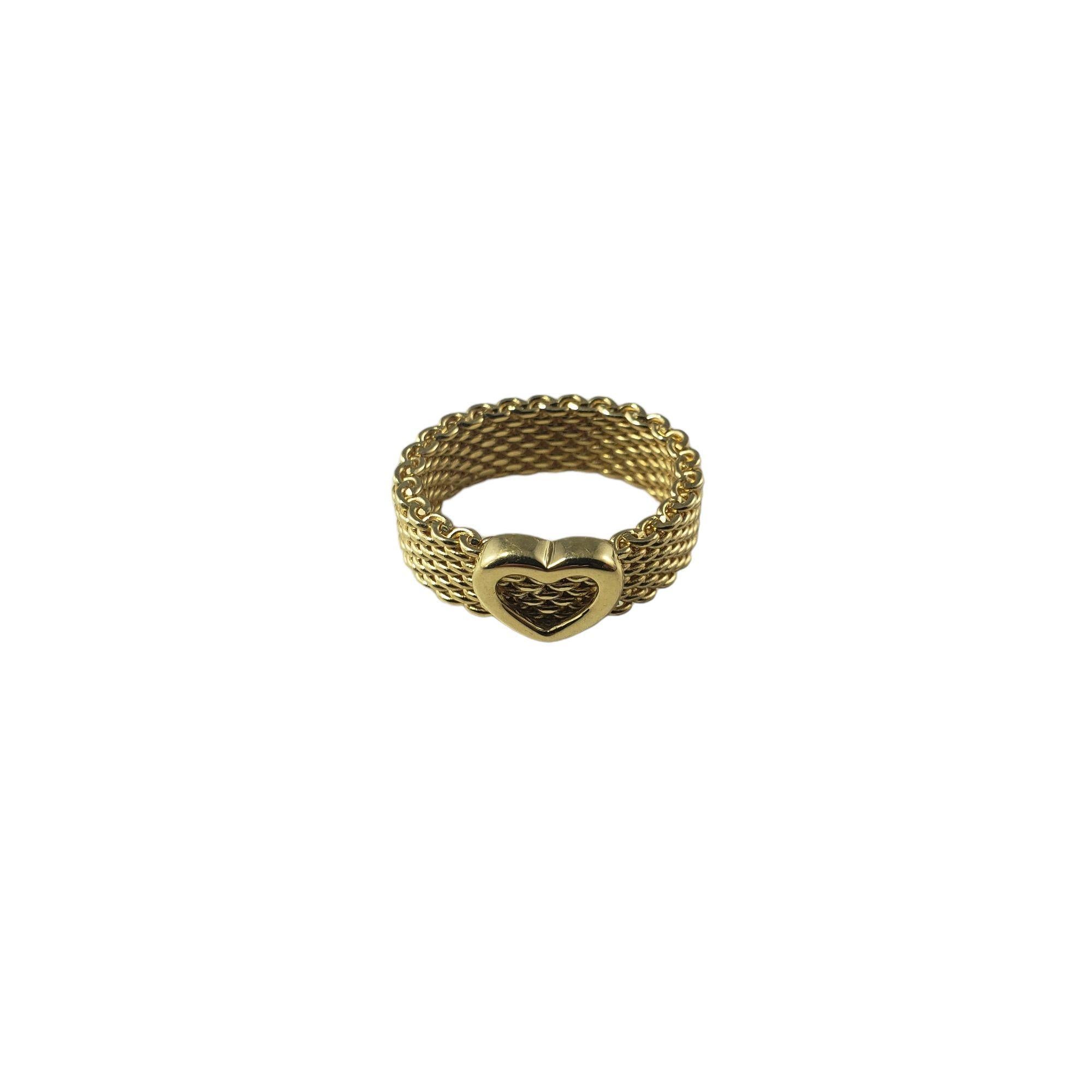 Tiffany & Co. 18 Karat Yellow Gold Somerset Heart Mesh Ring Size 5

This stunning heart mesh ring by Tiffany & Co. is crafted in meticulously detailed 18K yellow gold. 

Width: 6 mm.

Ring Size: 5

Weight: 7.0 gr./ 4.5 dwt.

Hallmark: T&CO 750

Very