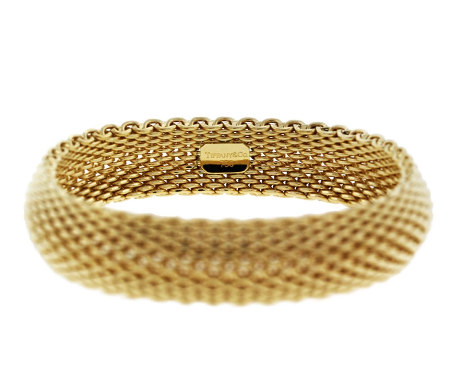 Tiffany & Co. 18 Karat Yellow Gold Somerset Mesh Bracelet Cuff 

Excellent Like New Condition 

Width - Approximately 15mm

18 Karat Yellow Gold

91.1 Grams 
