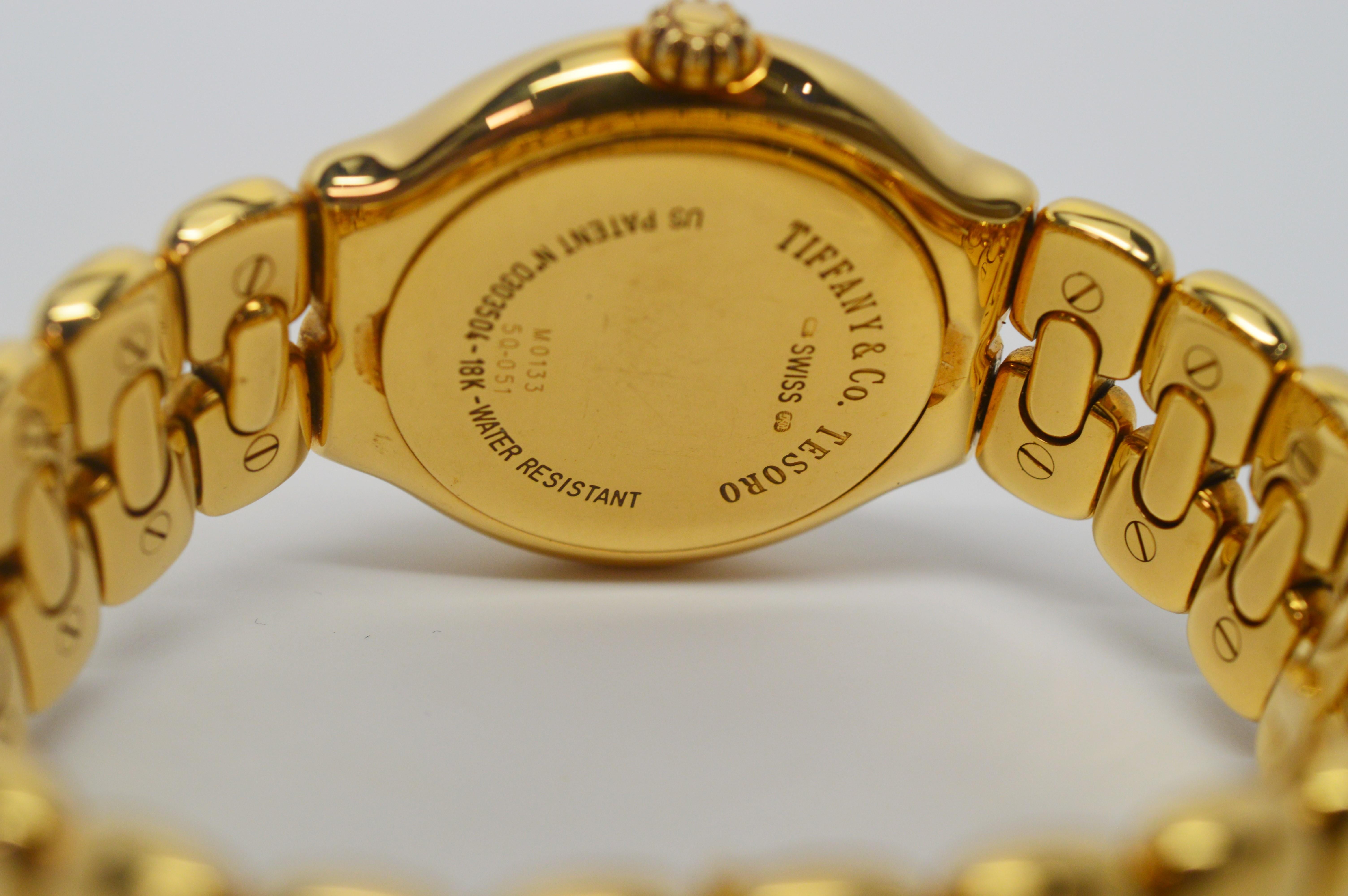 Tiffany & Co. Montre à quartz Tesoro en or jaune 18 carats Unisexe en vente