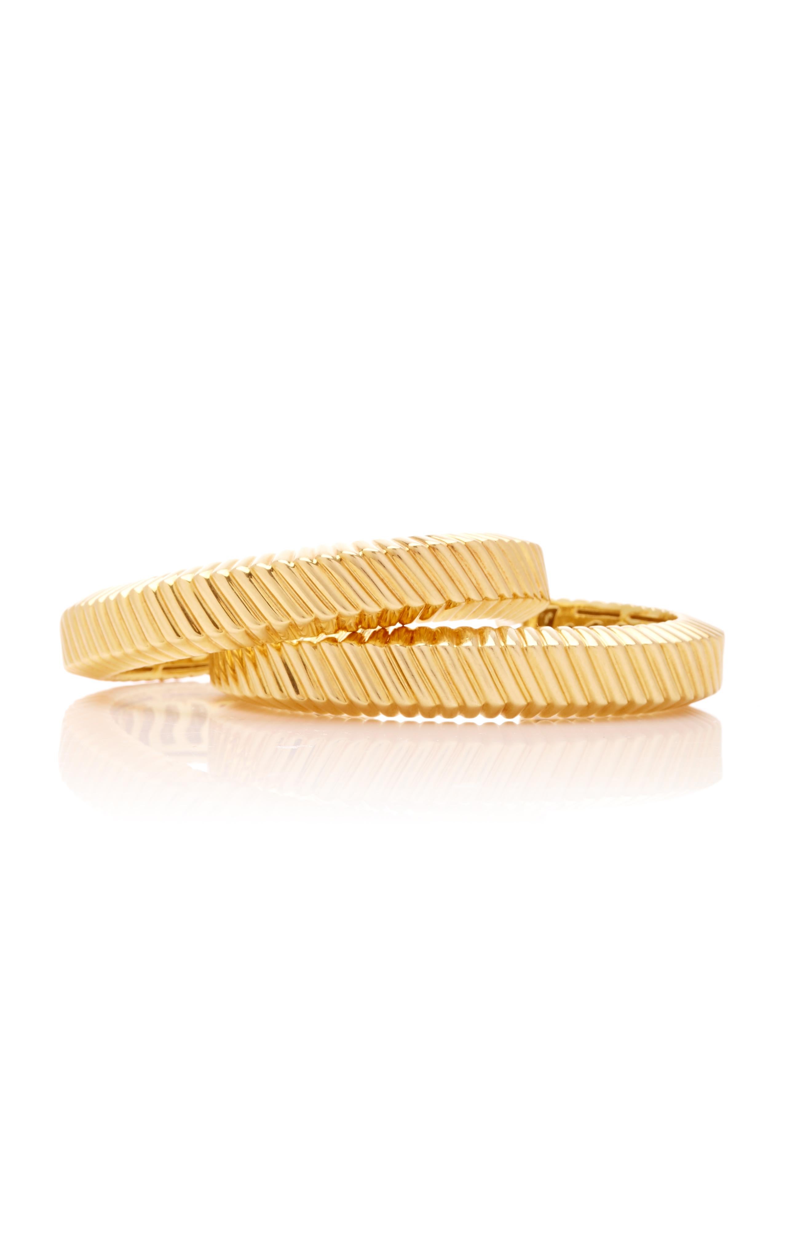How stylish are these amazing Tiffany & Co 18k yellow gold textured cuffs. 
It seemed appropriate to keep them as a matching set since they are both from the same year, 1998 and they look smashing as a pair - twice the style. Beautifully crafted, as