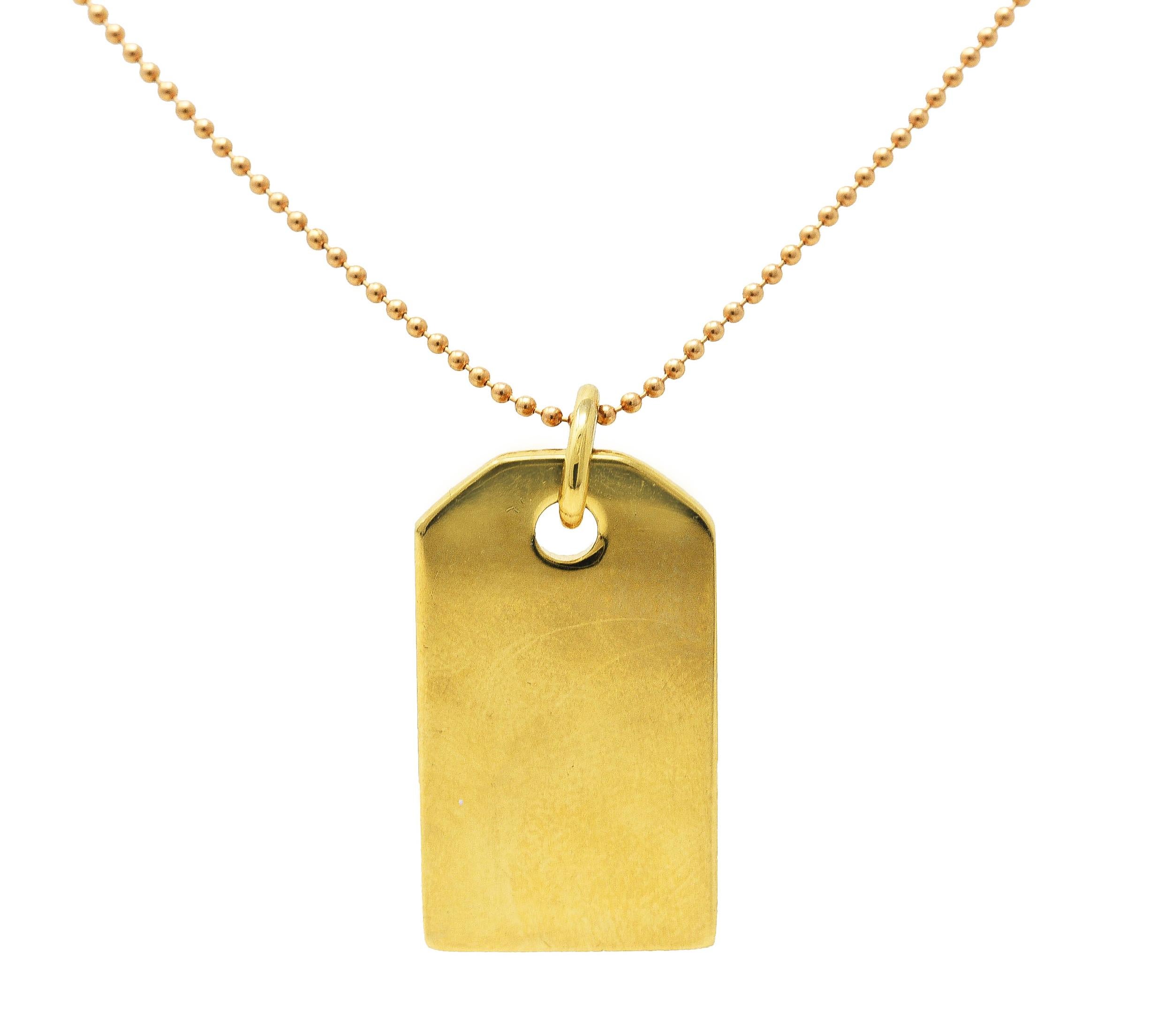 Tiffany & Co. 18 Karat Yellow Gold Vintage Tag Pendant Necklace In Excellent Condition In Philadelphia, PA