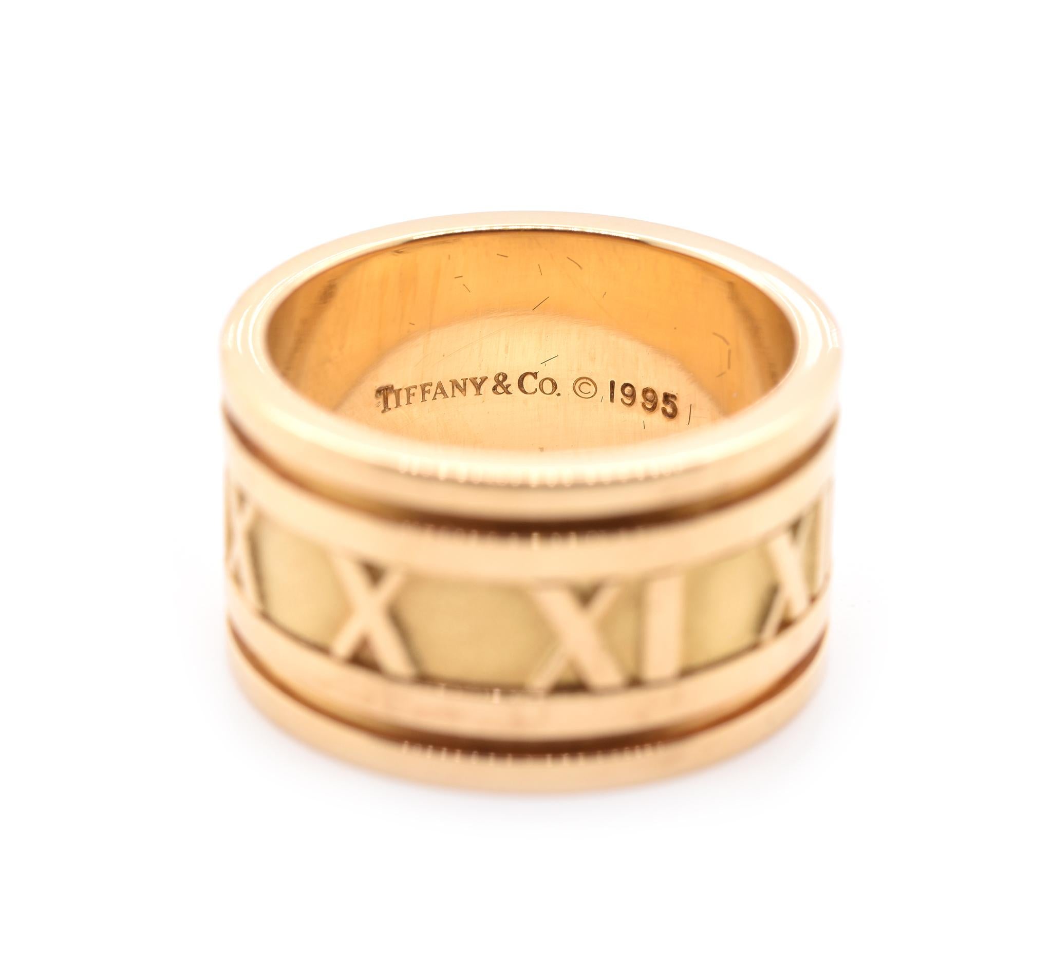 Designer: Tiffany & Co. 
Material: 18K yellow gold
Dimensions: band measures 12mm wide
Size: 7.5
Weight: 15.90 grams
