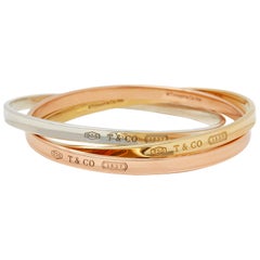 Tiffany & Co. 18 Karat Yellow, Rose Gold and Silver 1837 Bangle Bracelet