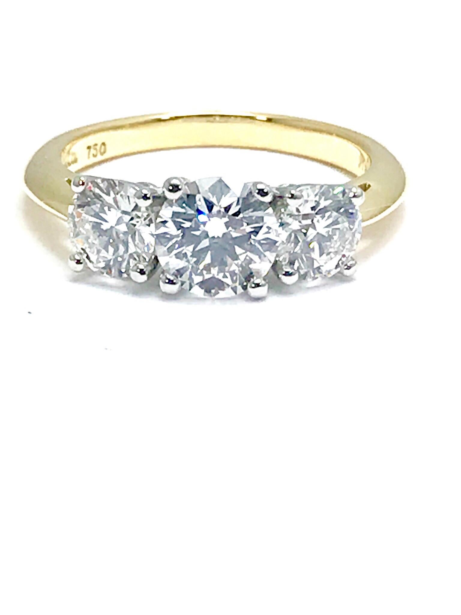 Modern Tiffany & Co. 1.82 Carat Total Three Diamond Platinum and Yellow Gold Ring