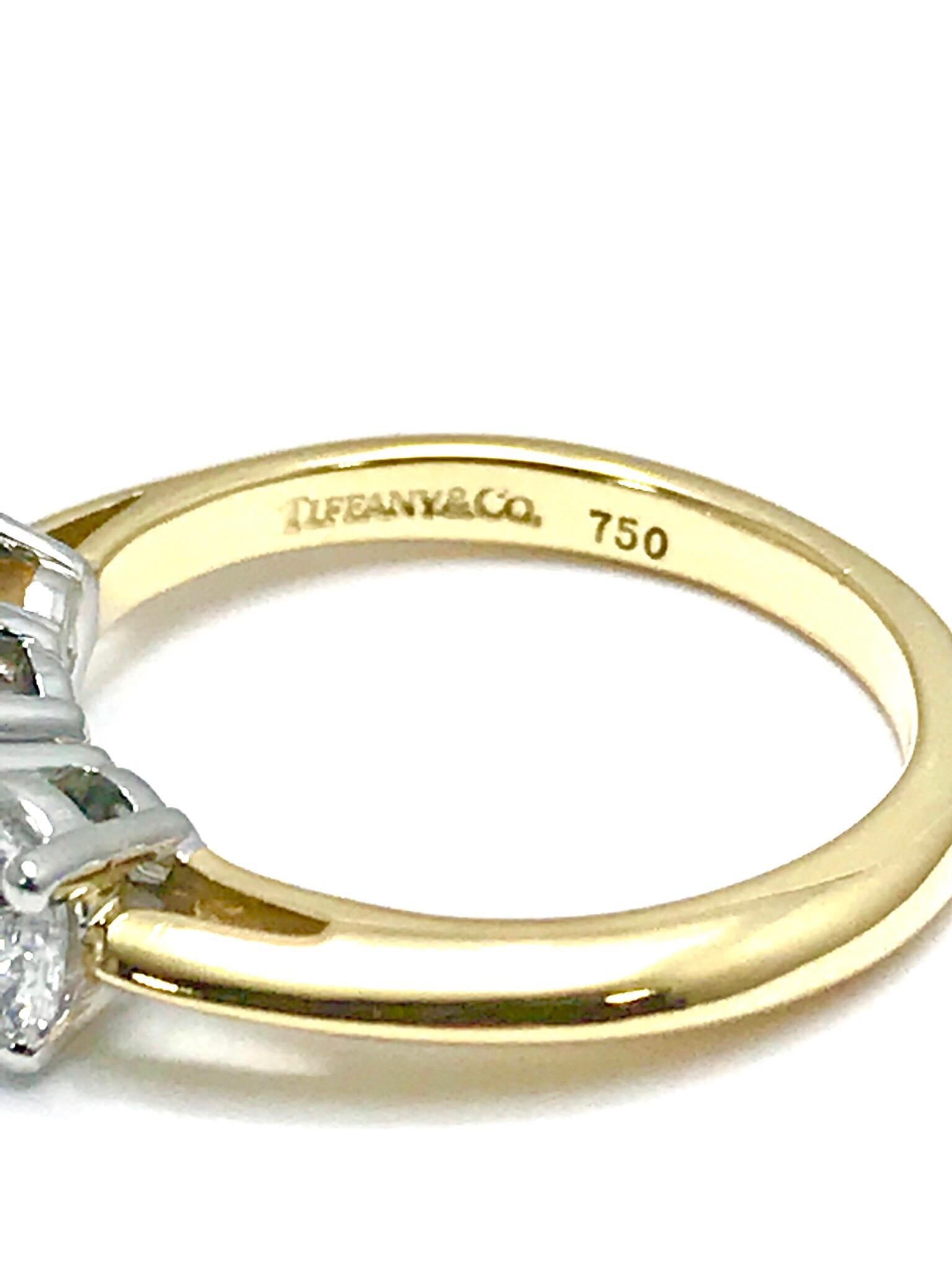 Round Cut Tiffany & Co. 1.82 Carat Total Three Diamond Platinum and Yellow Gold Ring