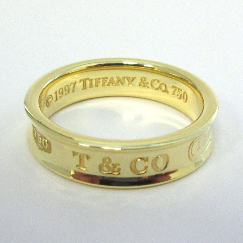 TIFFANY & Co. 1837 18K Gold 6mm Band Ring 11.5 Men's

Metal: 18K yellow gold 
Size: 11.5
Band Width: 6mm
Weight: 10.60 gram
Hallmark: 