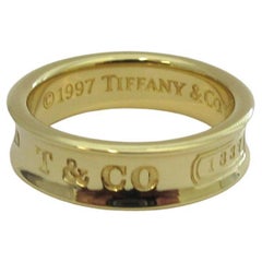 TIFFANY & Co. 1837 Anello largo 6 mm in oro 18K 7,5