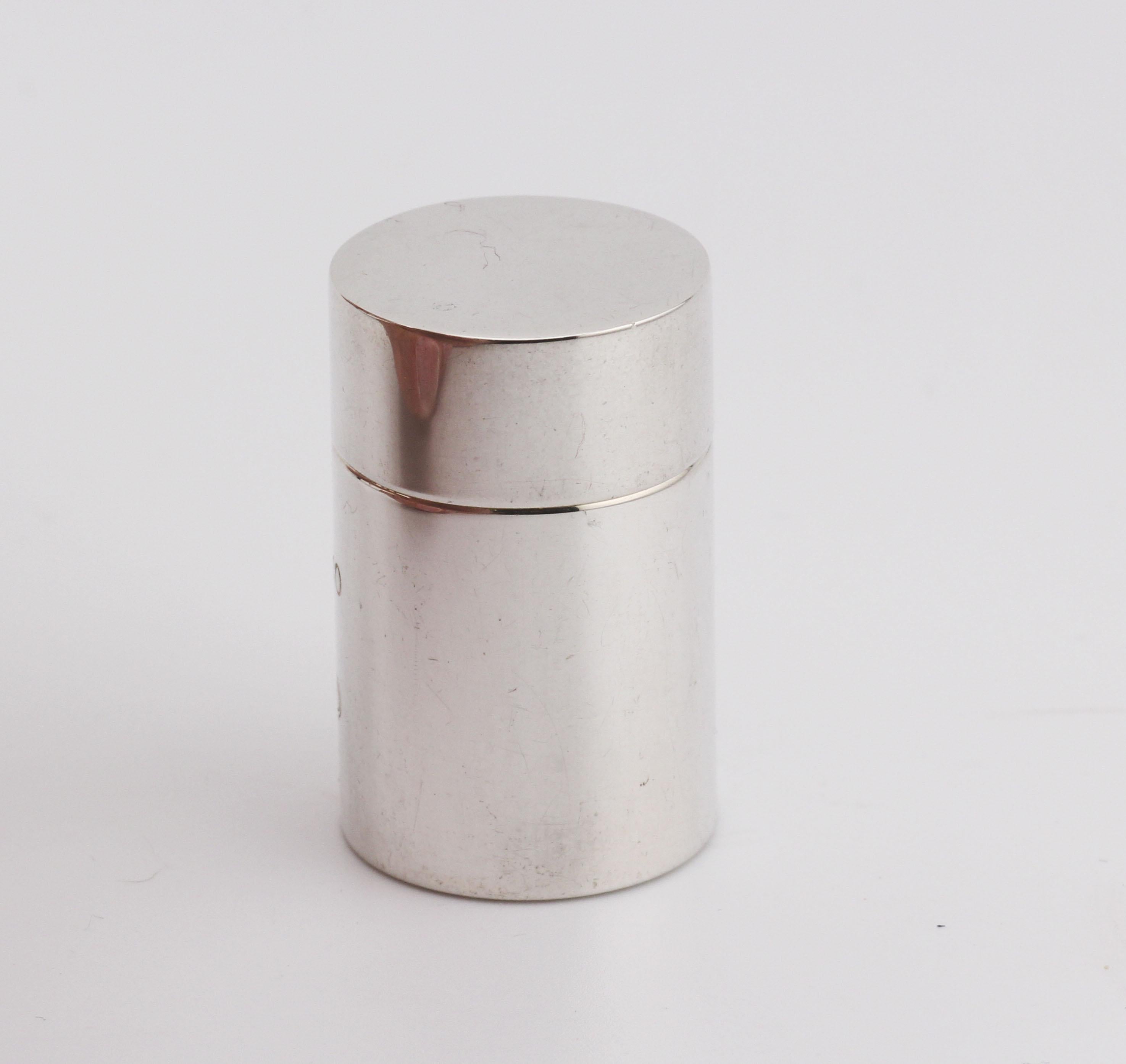 The Tiffany & Co. 1837 925 Sterling Silver Screw Top Pill Box Case is a sleek and sophisticated accessory, embodying the timeless elegance that Tiffany & Co. is renowned for. This pill box is part of the iconic 1837 Collection, which celebrates the