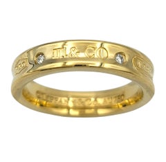 Tiffany & Co. 1837 Band Ring with Diamonds in 18 Karat Yellow Gold