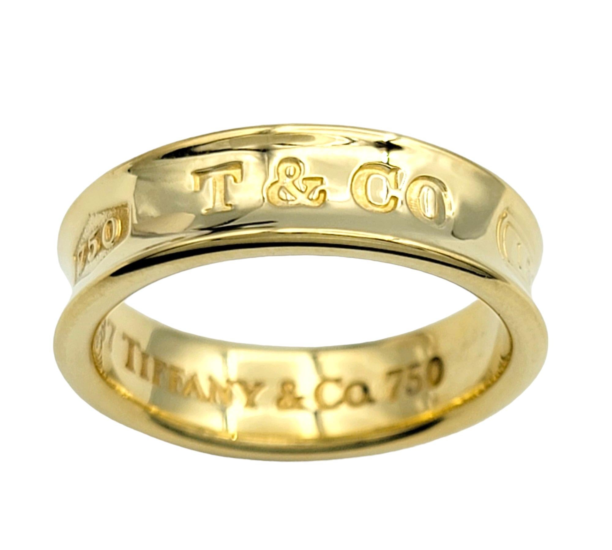 Ring size: 8

The classically beautiful 1837 Collection band ring by Tiffany & Co. is the essence of understated elegance. With its timeless and uncomplicated design, this sophisticated ring boasts simple yet sleek curves and contours that make it