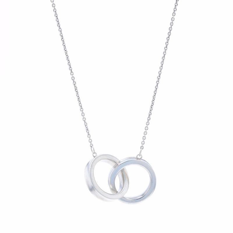 Brand: Tiffany & Co.
Collection: 1837
Design:  Interlocking Circles

Metal Content: Sterling Silver

Chain Style: Cable
Necklace Style: Chain
Fastening Type: Spring Ring Clasp

Measurements

Item 1: Attached Interlocking Circles
Tall: 19/32