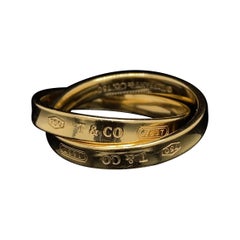 Tiffany & Co. 1837" Ring mit ineinandergreifenden Kreisen 18 Karat Gelbgold