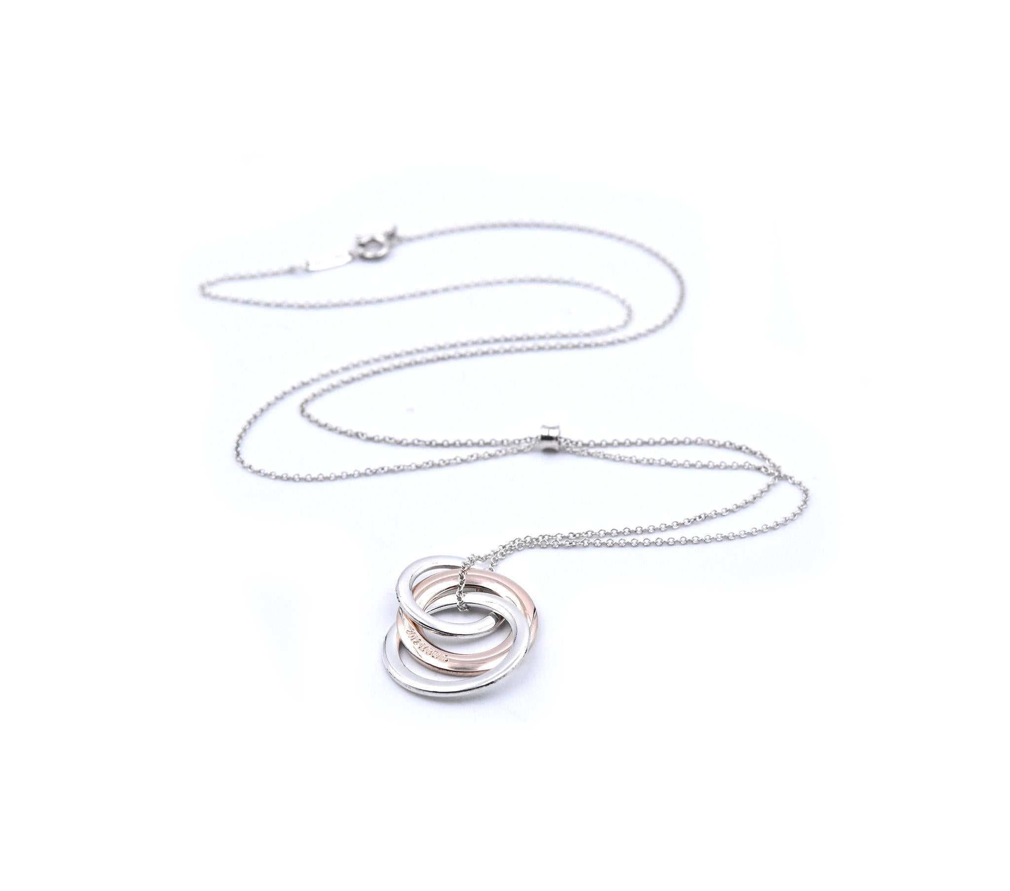 Designer: Tiffany & Co.
Material: sterling silver and rubedo
Dimensions: necklace measures 23 inches long and pendant measures 19.40mm in diameter
Weight: 5.46 grams
