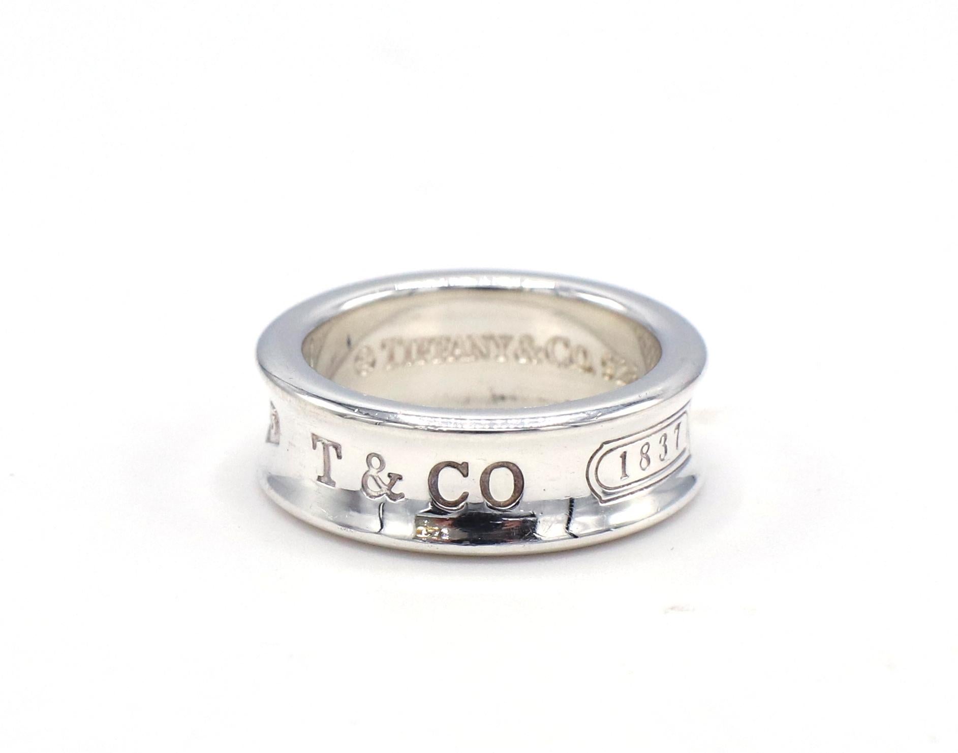 Tiffany & Co. 1837 Sterling Silver Vintage Band Ring 
Metal: Sterling silver
Weight: 7.59 grams
Size: 5.75 (US)
Width: 7mm
Signed: Tiffany & Co. 925 