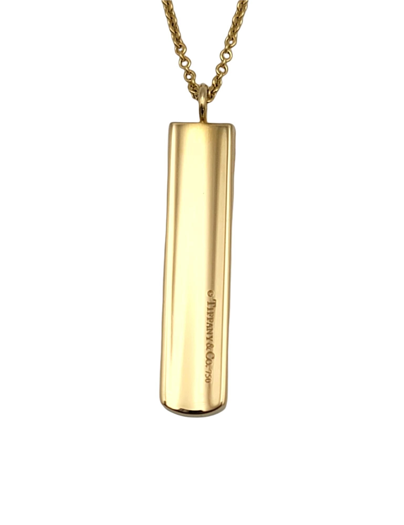 Chic engraved bar necklace by Tiffany & Co. is the epitome of modern elegance. The simple yet timeless design makes for a piece that you will wear time and time again.  

Metal: 18K Yellow Gold
Weight: 17.4 grams
Chain Length: 20