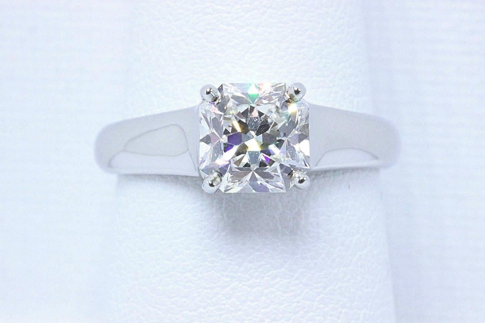 Tiffany & Co.

Style: Lucida Diamond Engagement Ring
Serial Number:  16774529 / C06200161
Metal:  Platinum PT950
Total Carat Weight:  1.84 TCW
Diamond Shape:  Lucida Cut
Diamond Color & Clarity:  F / VVS2
Hallmark:  