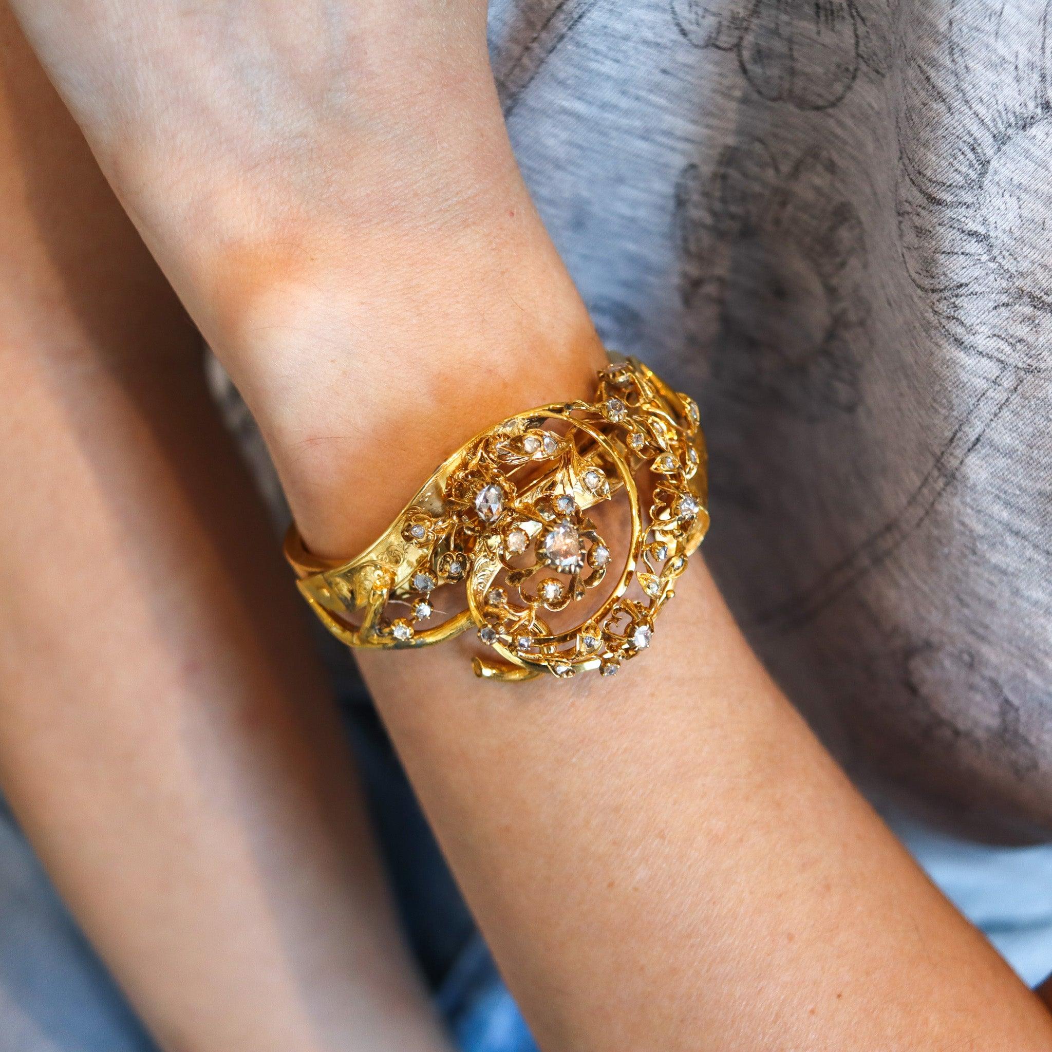 a Victorian bangle bracelet with diamonds designed by Tiffany & Co.

This is a very rare antique bangle bracelet, created in New York City by Tiffany & Co. during the high Victorian era, back in the 1880.The bracelet was designed in three dimensions