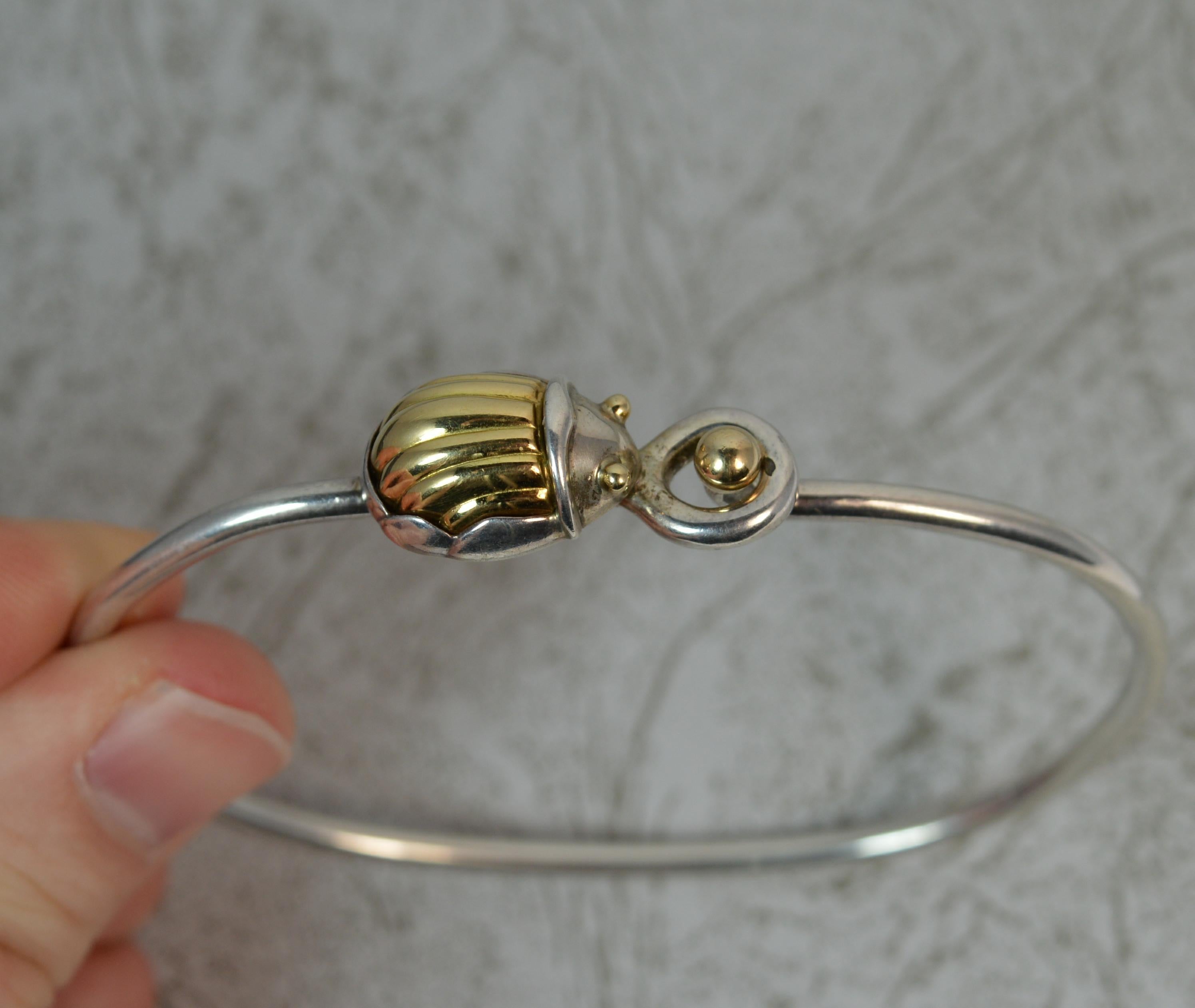 Tiffany & Co. 18 Carat Gold Silver Torque Bangle Scarab Beetle In Excellent Condition In St Helens, GB