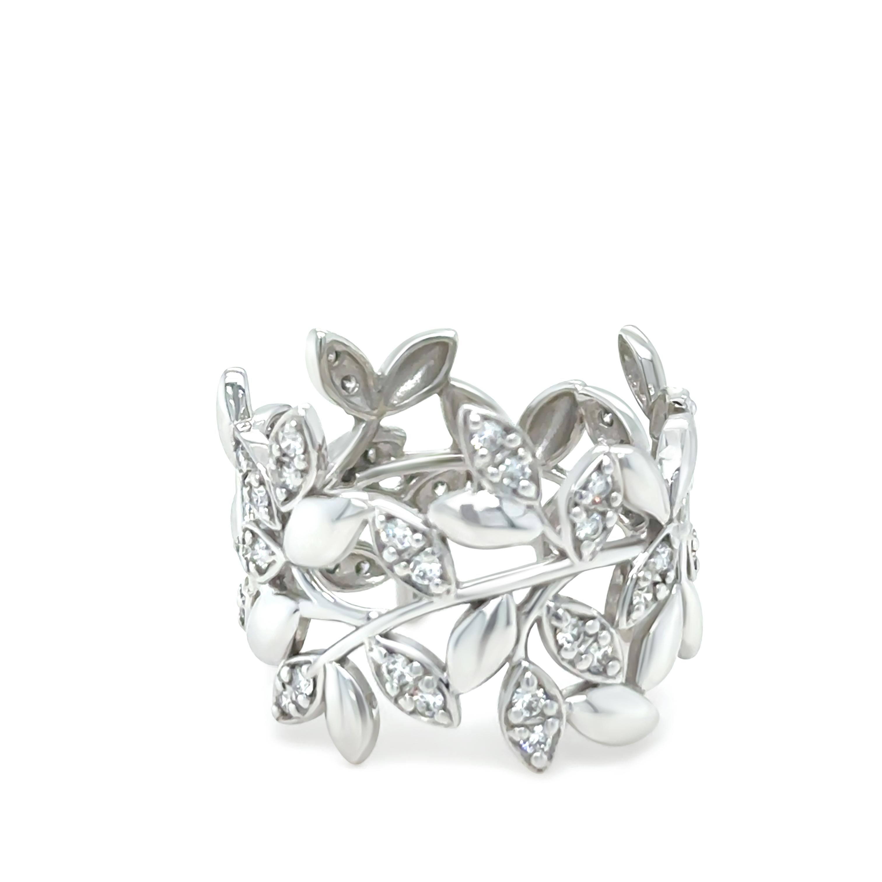 An exquisite Paloma Picasso Olive Leaf ring crafted in 18ct white gold, weighing 7.7 grams. This intricately designed piece features 46 round brilliant cut diamonds with a total carat weight of 0.46ct.

The diamonds are meticulously set throughout