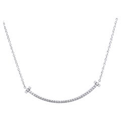 Colgante de diamantes T Smile en oro blanco de 18 ct 0,10 ct 2,37 g Tiffany & Co.
