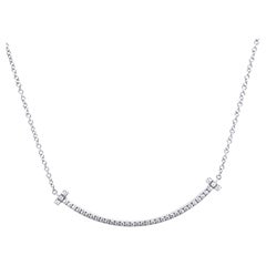 Colgante de diamantes T Smile en oro blanco de 18 ct 0,10 ct 2,37 g Tiffany & Co.