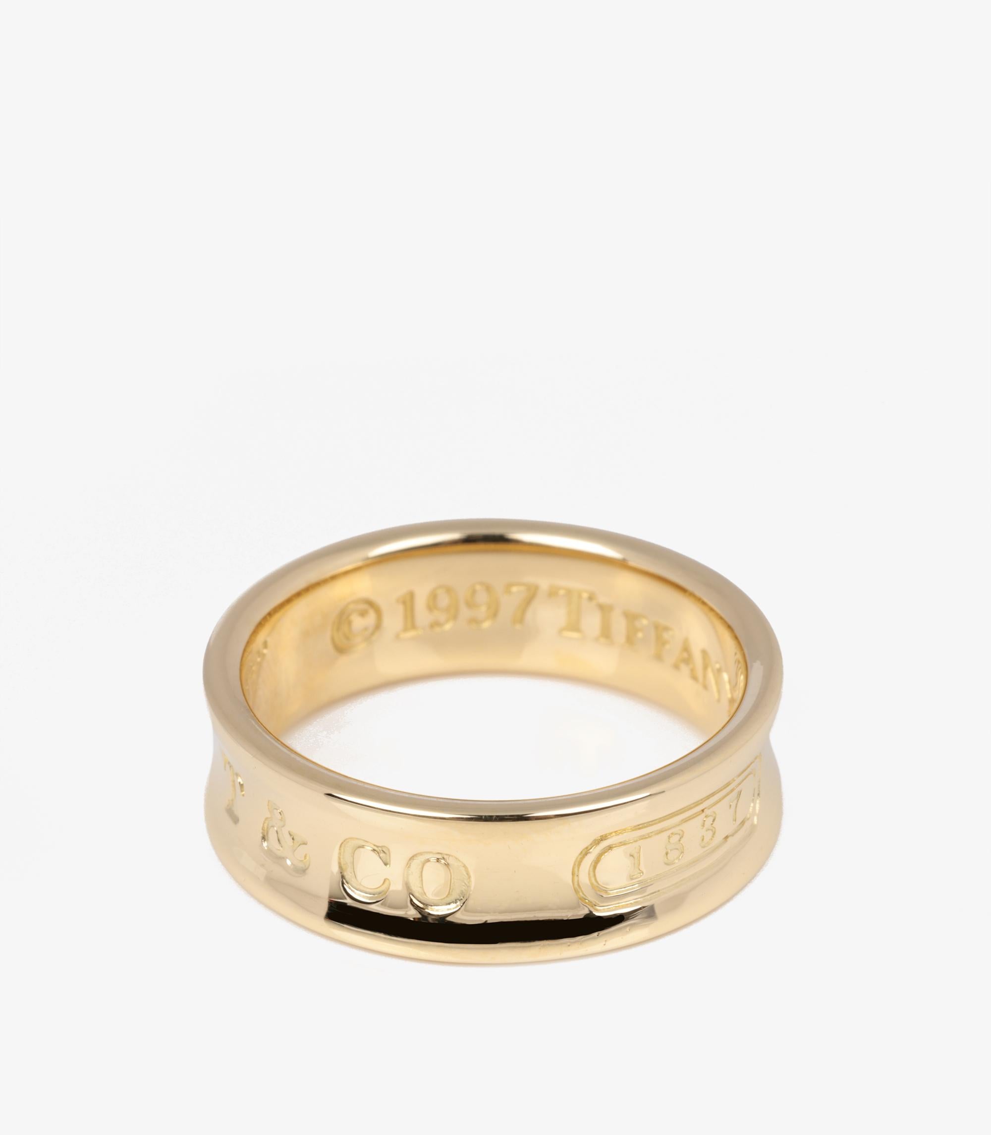 Tiffany & Co. 18ct Yellow Gold 1837 Band Ring

Brand- Tiffany & Co.
Model- 1837 Band Ring
Product Type- Ring
Material(s)- 18ct Yellow Gold
UK Ring Size- L 1/2
EU Ring Size- 52
US Ring Size- 6
Resizing Possible- No

Band Width- 6mm
Total Weight-