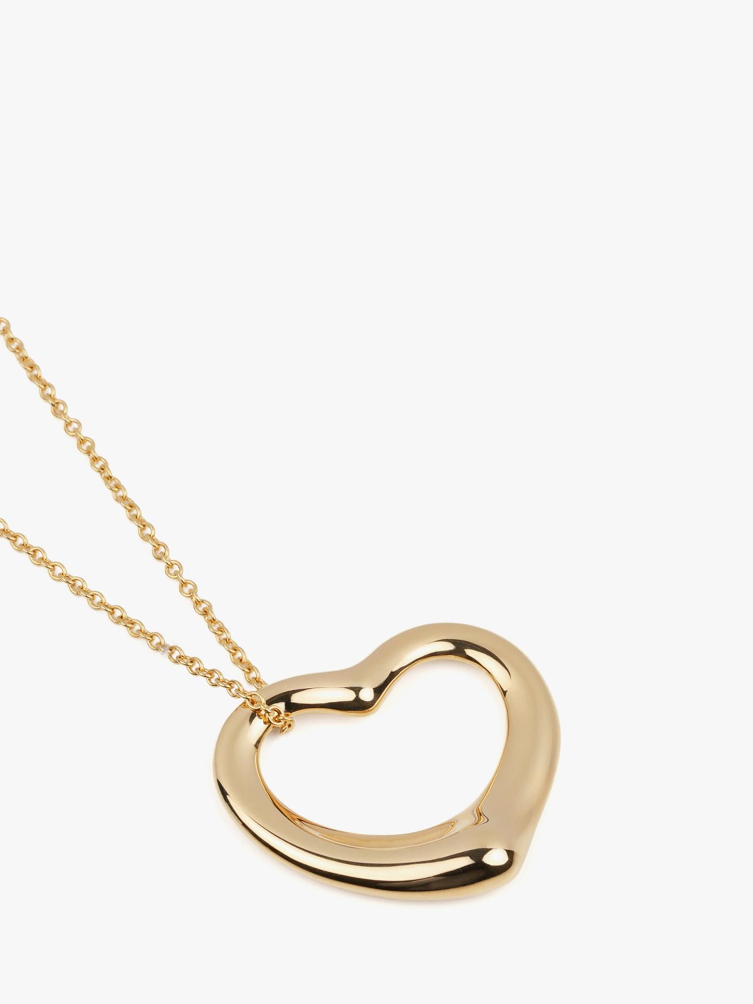 Elsa & Co. Ciondolo a cuore aperto in oro giallo 18ct 22mm Elsa Peretti for Tiffany & Co.

Dettagli del prodotto
Xupes Ref: J1575
Marchio: Tiffany & Co.
Model: Ciondolo a cuore aperto da 22 mm
Tipo: Collana
PREZZO DI VENDITA: 2.375 EURO
Accompagnato