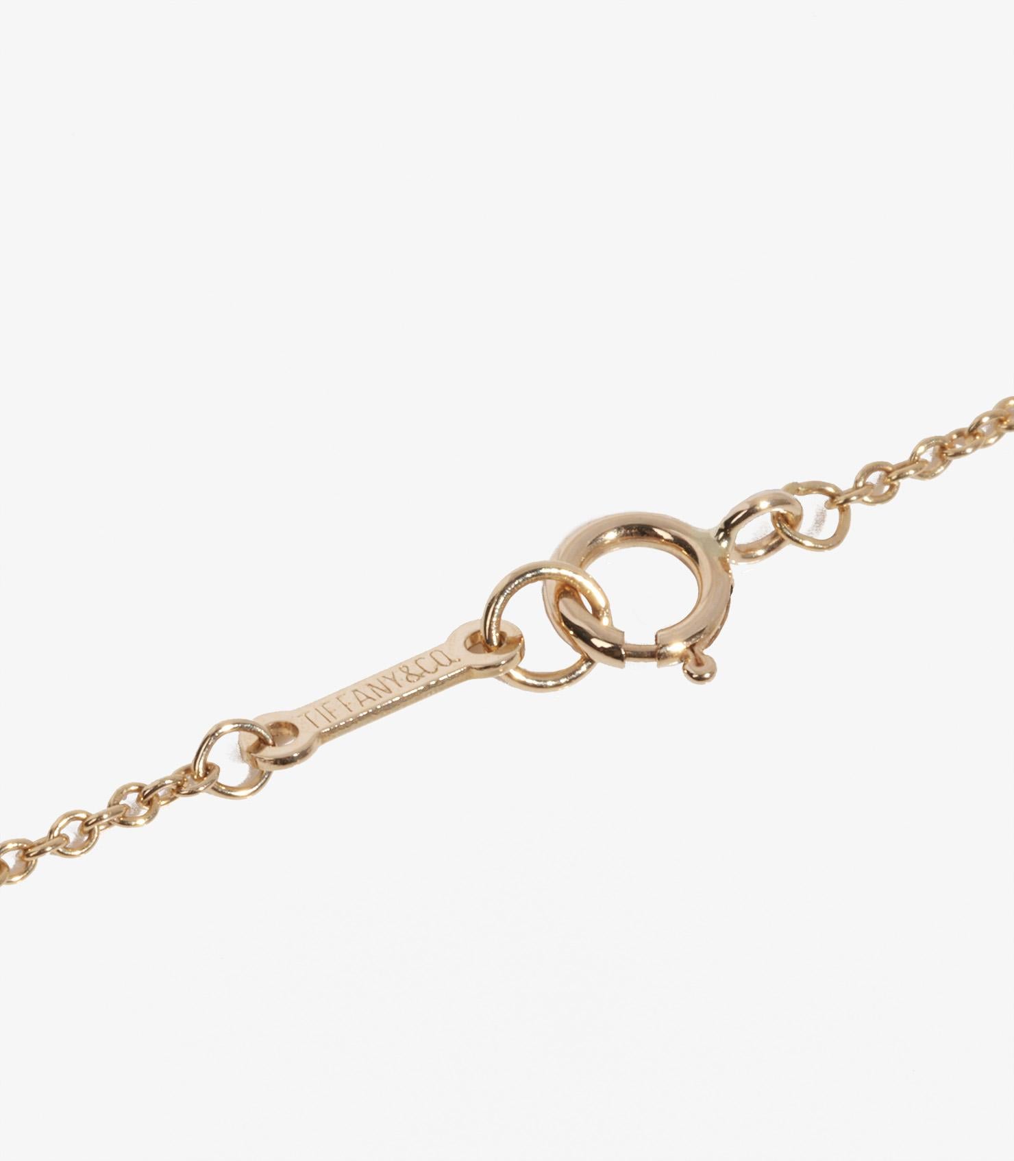 Tiffany & Co. 18ct Yellow Gold Elsa Peretti 11mm Bean Design Pendant

Brand- Tiffany & Co.
Model- Bean Design Necklace
Product Type- Necklace
Material(s)- 18ct Yellow Gold

Necklace Length- 40.5cm
Pendant Length- 1.1cm
Pendant Width- 0.8cm
Total