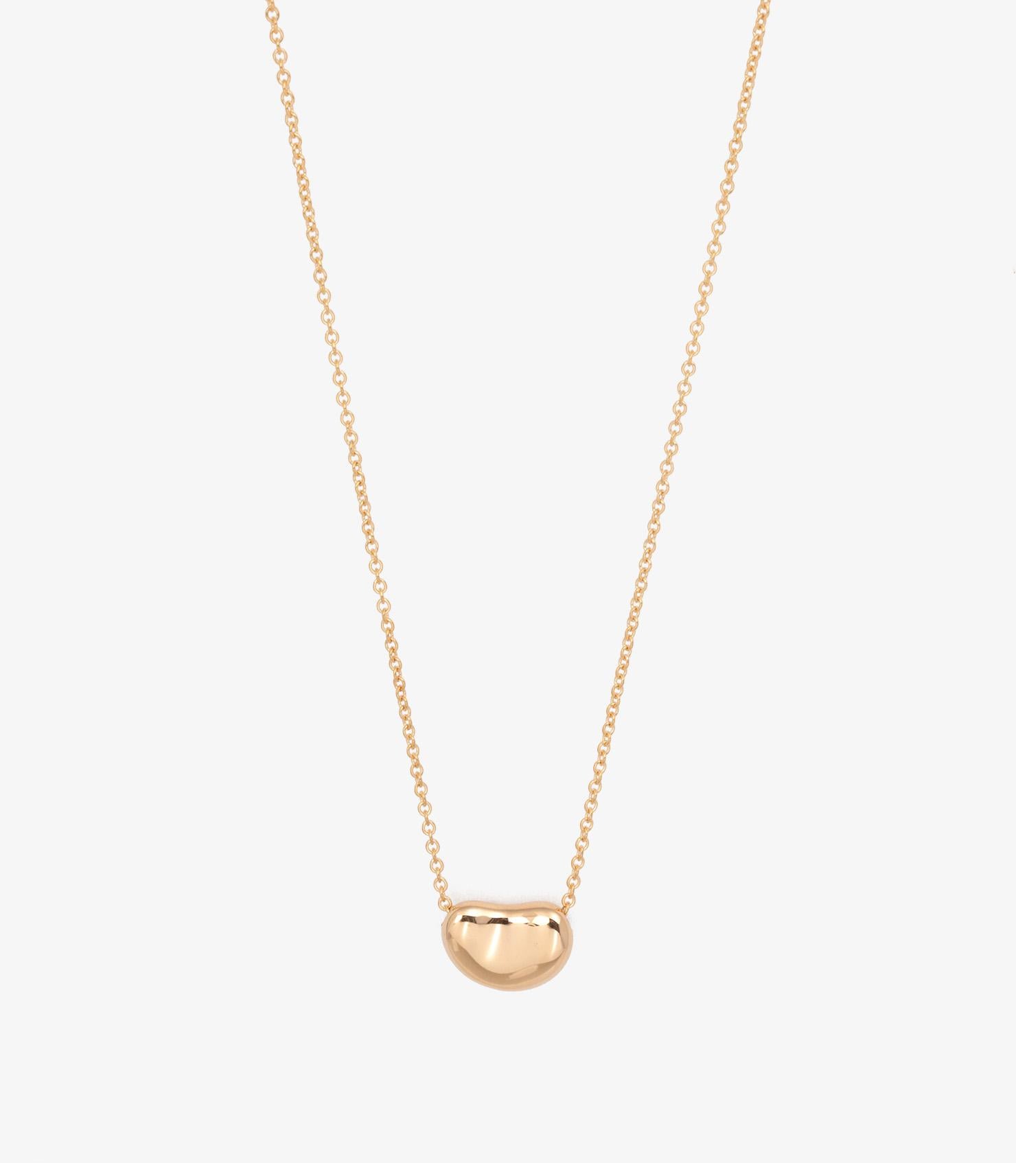 Tiffany & Co. 18ct Yellow Gold Elsa Peretti 11mm Bean Design Pendant

Brand- Tiffany & Co.
Model- Bean Design Necklace
Product Type- Necklace
Material(s)- 18ct Yellow Gold

Necklace Length- 40.7cm
Pendant Length- 1.1cm
Pendant Width- 0.8cm
Total