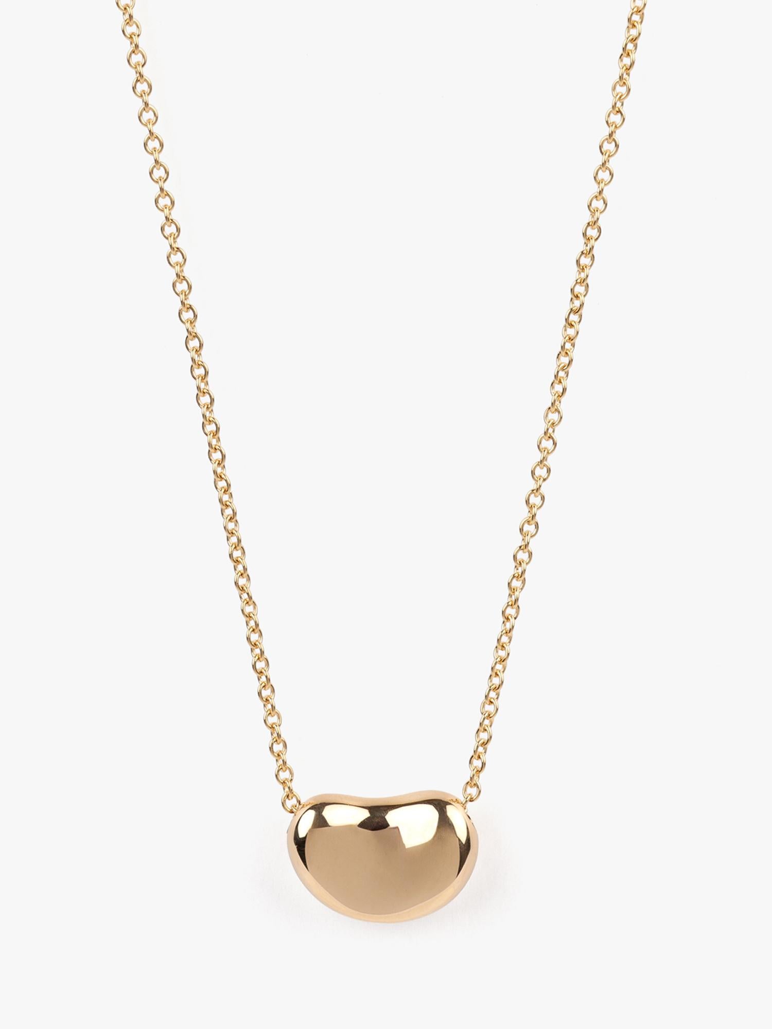 Tiffany & Co. 18 Karat Gelbgold Elsa Peretti 11 mm Bohnendesign-Anhänger

Details zum Produkt
Xupes Ref: J1606
Marke: Tiffany & Co.
Modell: Bohne Design Halskette
Art: Halskette
MATERIAL(e): 18 Karat Gelbgold

Spezifikation
Gesamtgewicht: 4,2