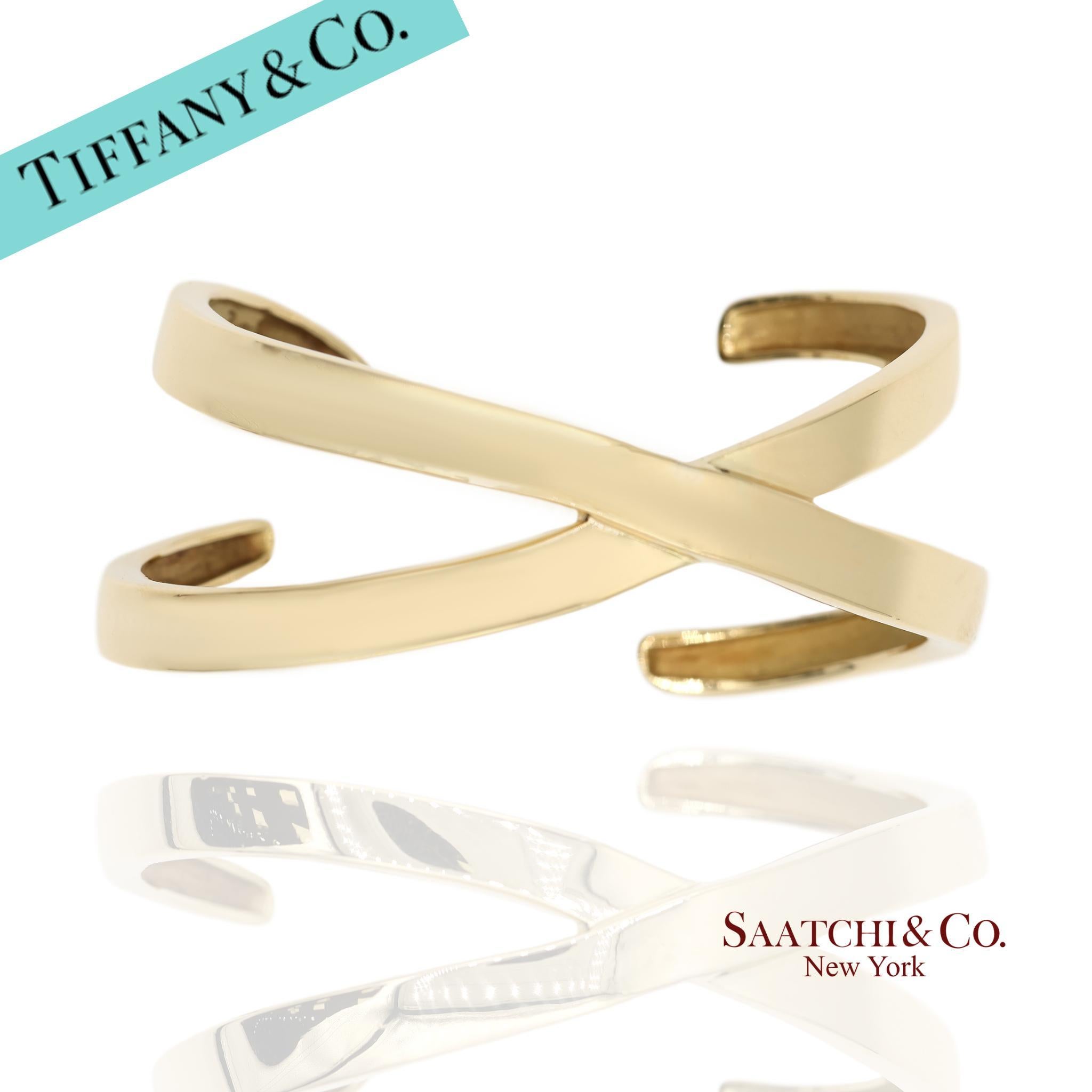 Tiffany & Co. Vintage 18k Paloma Picasso Graffiti Motif Cuff Bangle Bracelet

Metal Type: 18k Yellow Gold
Total Item Weight: 51.3 Grams
Length: 70.0 mm
Width: 32.0 mm
Height: 4.5 mm
Sizable: No
Details:
Size: Small to Medium (approximately 6 to 6.5