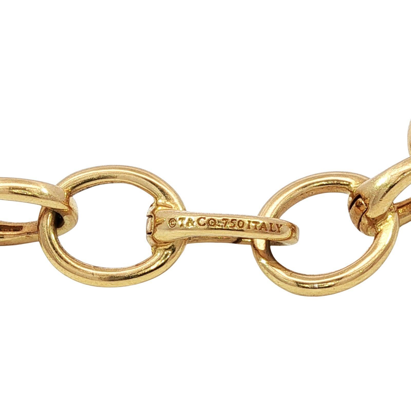 Tiffany & Co. 18K Clasping Charm Bracelet Or Jaune 13 Charm Links 7.25