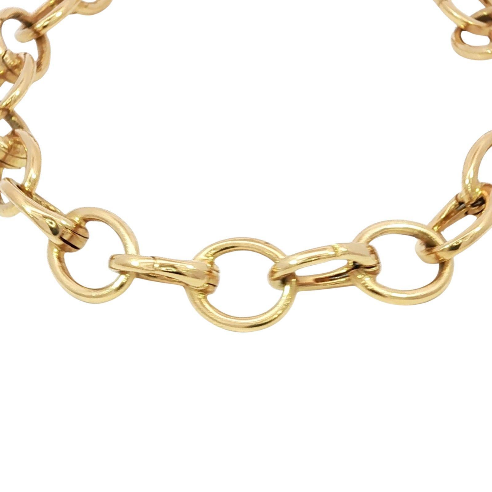 Tiffany & Co. 18K Clasping Charm Bracelet Or Jaune 13 Charm Links 7.25