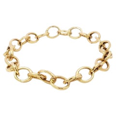 Tiffany & Co. 18K Clasping Charm Bracelet Or Jaune 13 Charm Links 7.25"