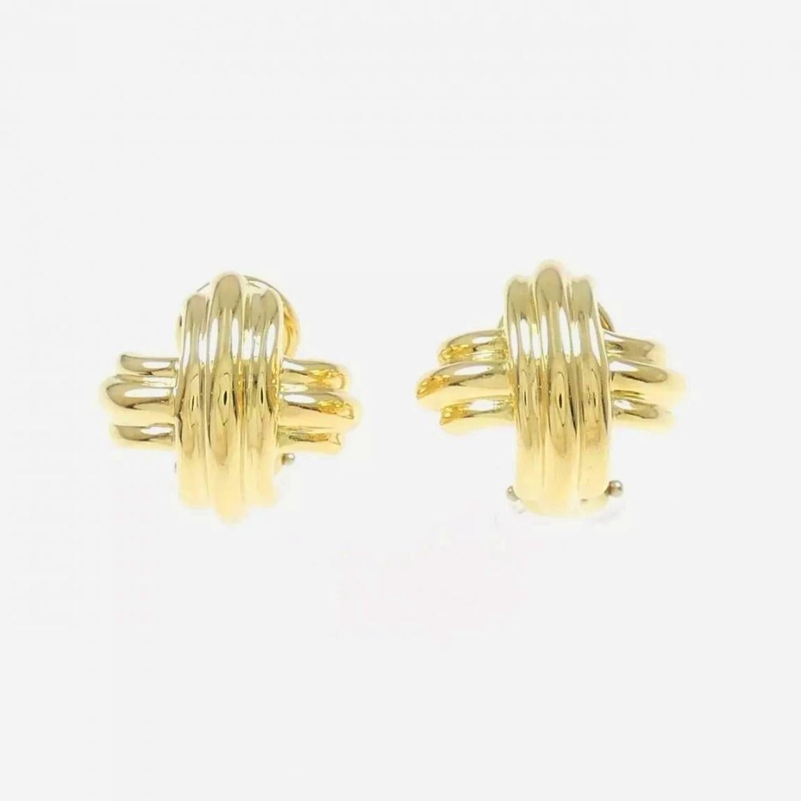 Pendientes TIFFANY & Co. de oro de 18 quilates de 18 mm de ancho con la X de la firma

Metal: Oro amarillo de 18 quilates
Medida 18 mm (0,71