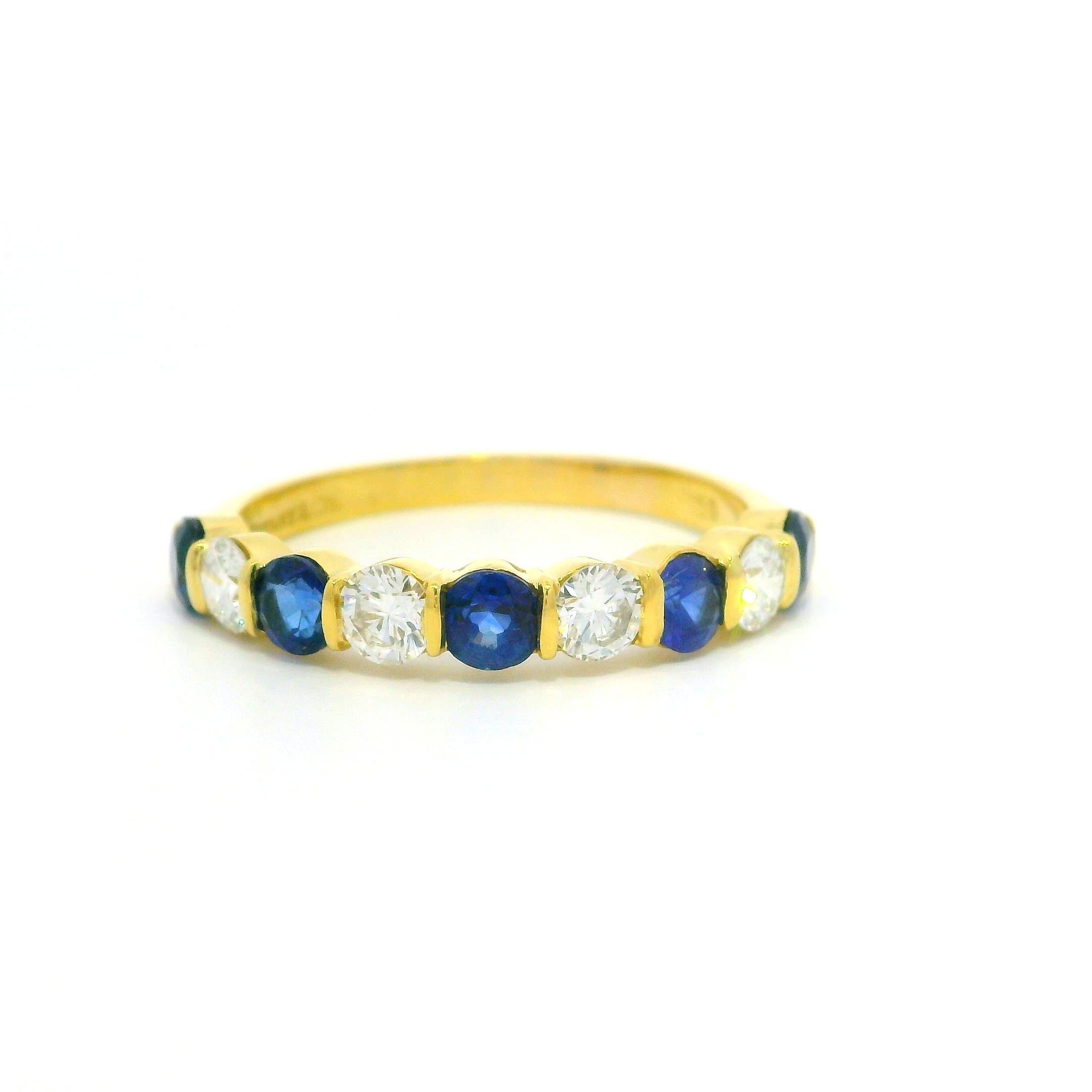 Tiffany & Co. 18k Gold 1.95ct Bar Channel Sapphire and Diamond 9 Stone Band Ring For Sale 6