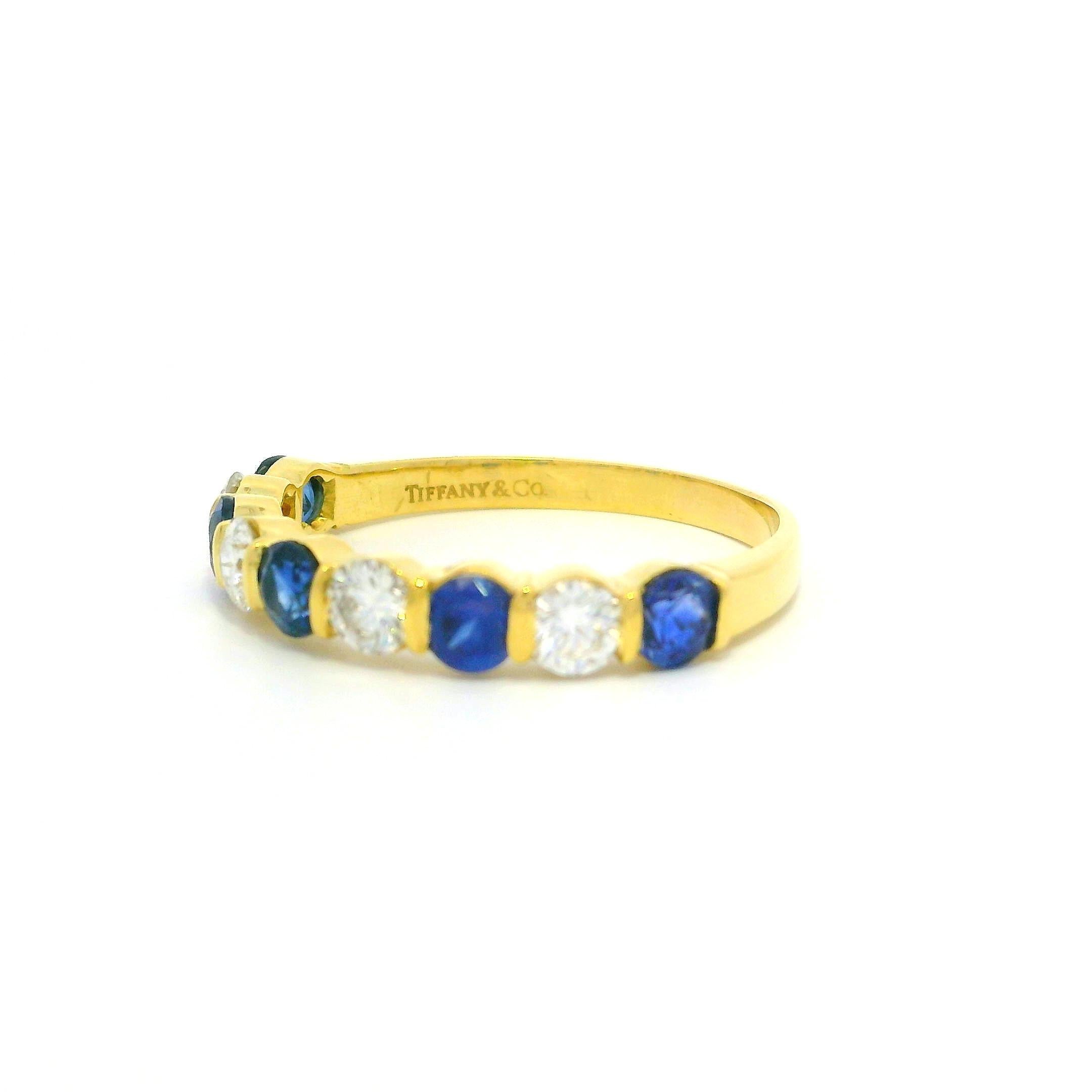 Round Cut Tiffany & Co. 18k Gold 1.95ct Bar Channel Sapphire and Diamond 9 Stone Band Ring For Sale