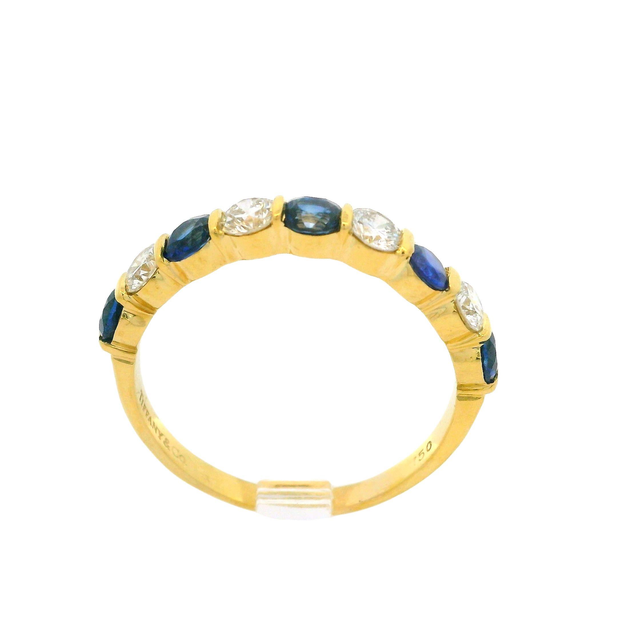 Tiffany & Co. 18k Gold 1.95ct Bar Channel Sapphire and Diamond 9 Stone Band Ring For Sale 1