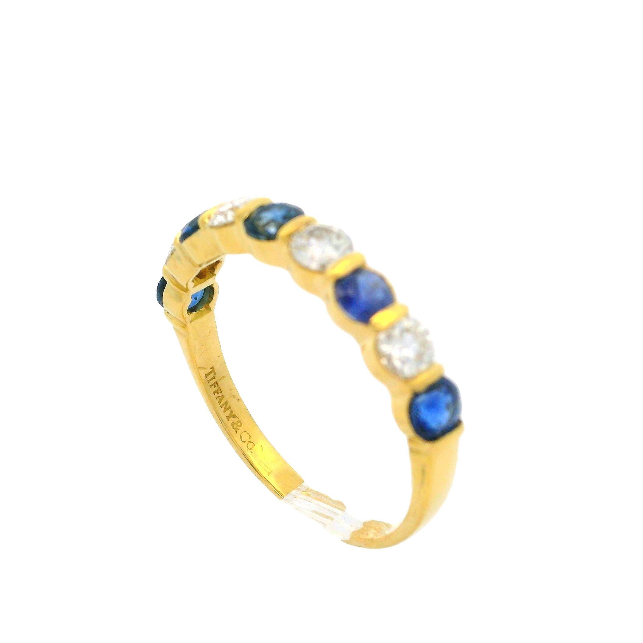 Tiffany & Co. 18k Gold 1.95ct Bar Channel Sapphire and Diamond 9 Stone Band Ring For Sale 3