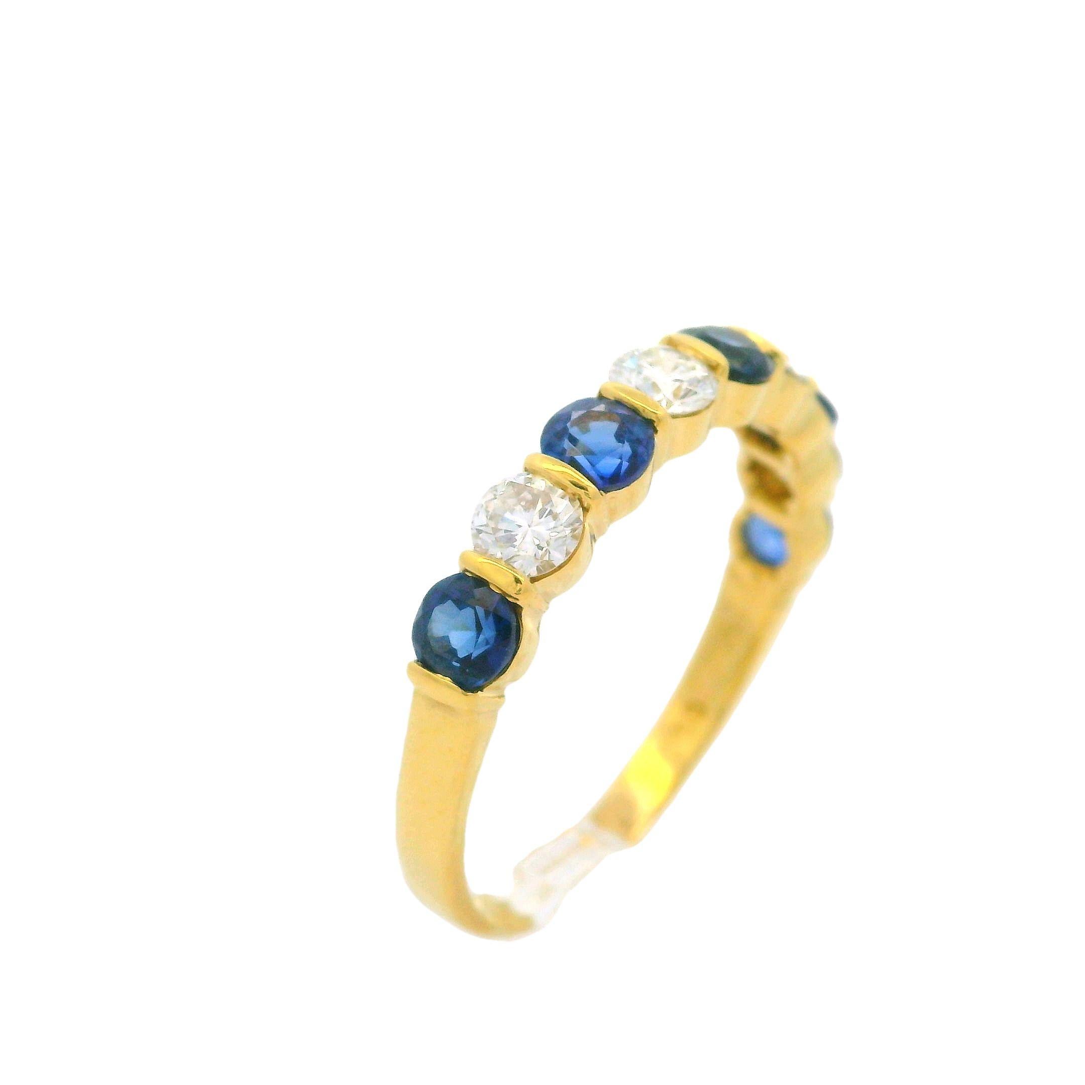 Tiffany & Co. 18k Gold 1.95ct Bar Channel Sapphire and Diamond 9 Stone Band Ring For Sale 4