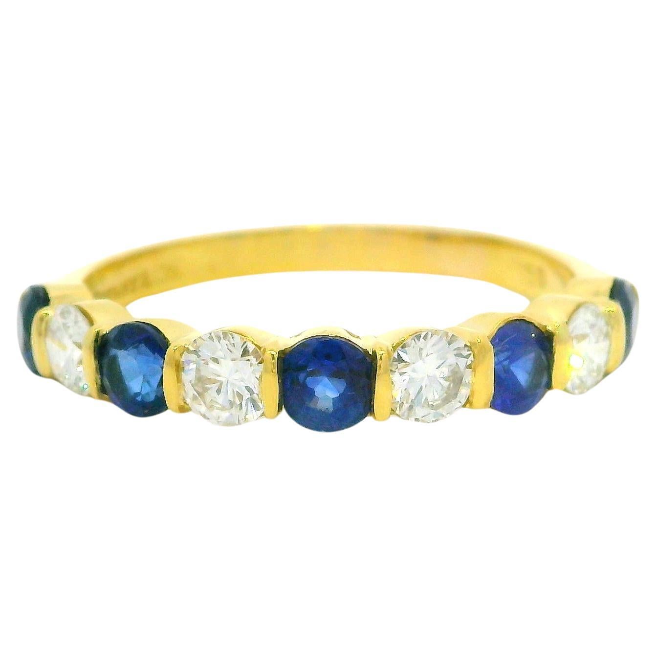 Tiffany & Co. 18k Gold 1.95ct Bar Channel Sapphire and Diamond 9 Stone Band Ring For Sale