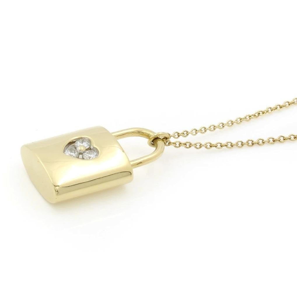 Donna Collana con lucchetto a forma di cuore con 3 diamanti in oro 18 carati di TIFFANY & Co. in vendita