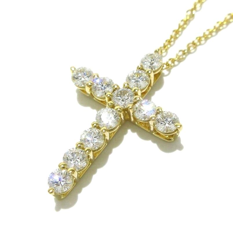 TIFFANY & Co. 18K Gold .42ct Diamond Cross Pendant Necklace

Metal: 18K Yellow Gold
Chain: 16