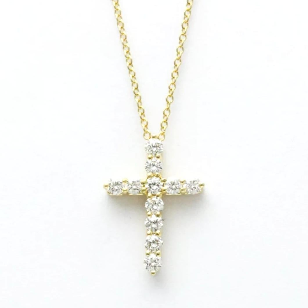 TIFFANY & Co. 18K Gold .42ct Diamond Cross Pendant Necklace

Metal: 18K Yellow Gold
Chain: 16
