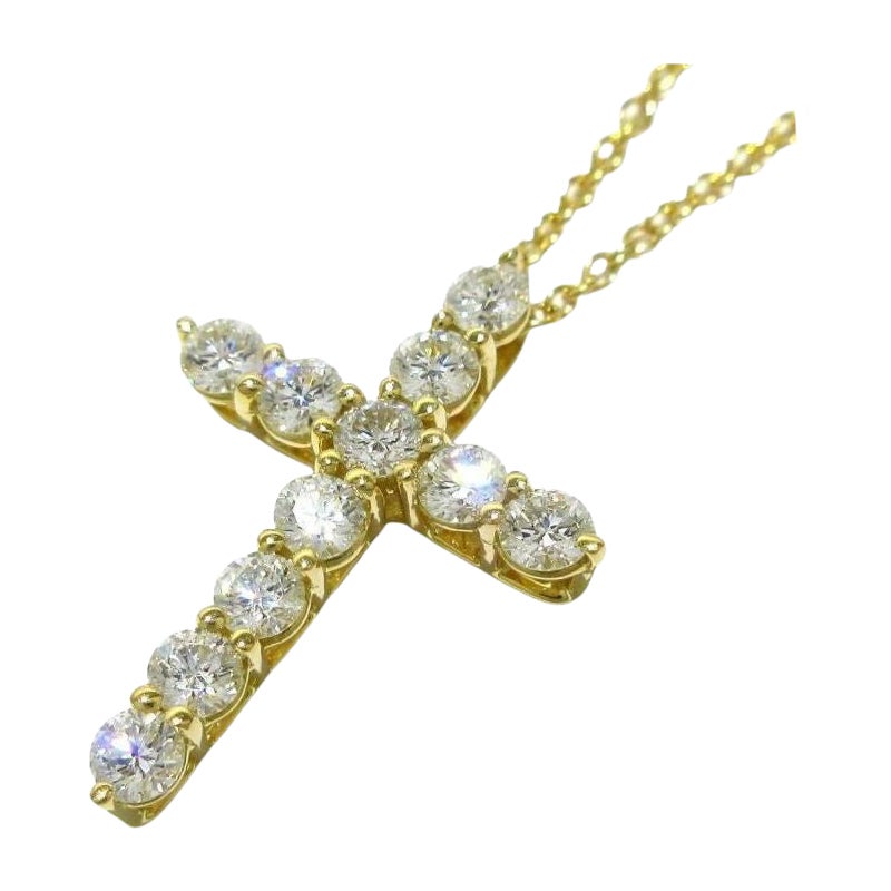 TIFFANY 
Co. 18K Gold .42ct Diamond Cross Pendant Necklace