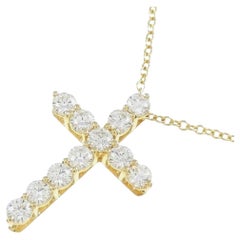 TIFFANY & Co. Collier pendentif croix en or 18K avec diamant de 0,42ct