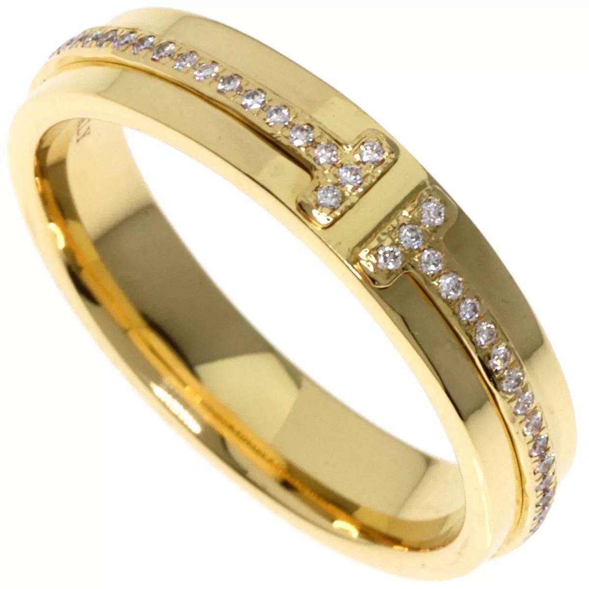 TIFFANY & Co. 18K Gold 4.5mm Wide Diamond T Ring 8

Tiffany T is an expression of love’s endless potential. Inspired by an archival bracelet from 1975, T is an homage to the House’s iconic motif and the spirit of New York, which founder Charles