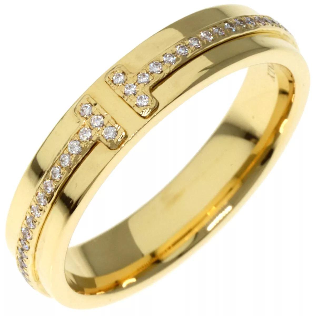 Round Cut TIFFANY & Co. 18K Gold 4.5mm Wide Diamond T Ring 8 For Sale